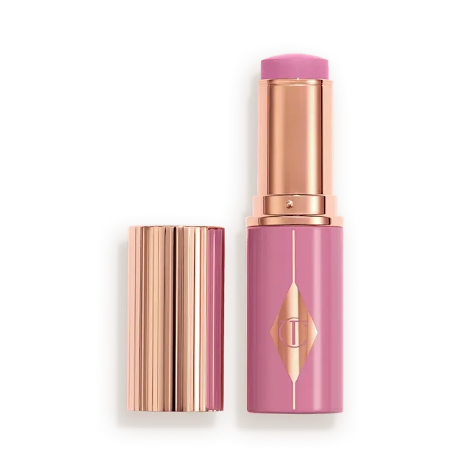 Charlotte Tilbury Unreal Lip + Cheek Glow Blush Stick with Hyaluronic Acid - Shade: Pretty Glow- The Powder Room
