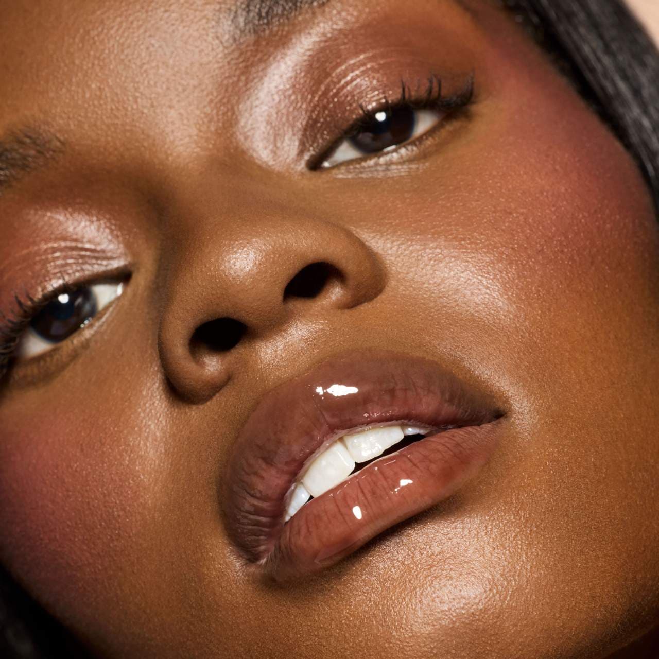 Fenty Beauty Gloss Bomb Heat Hot Chocolit 04 sheer rich brown lip plumper wet look shine tawny brown cruelty free