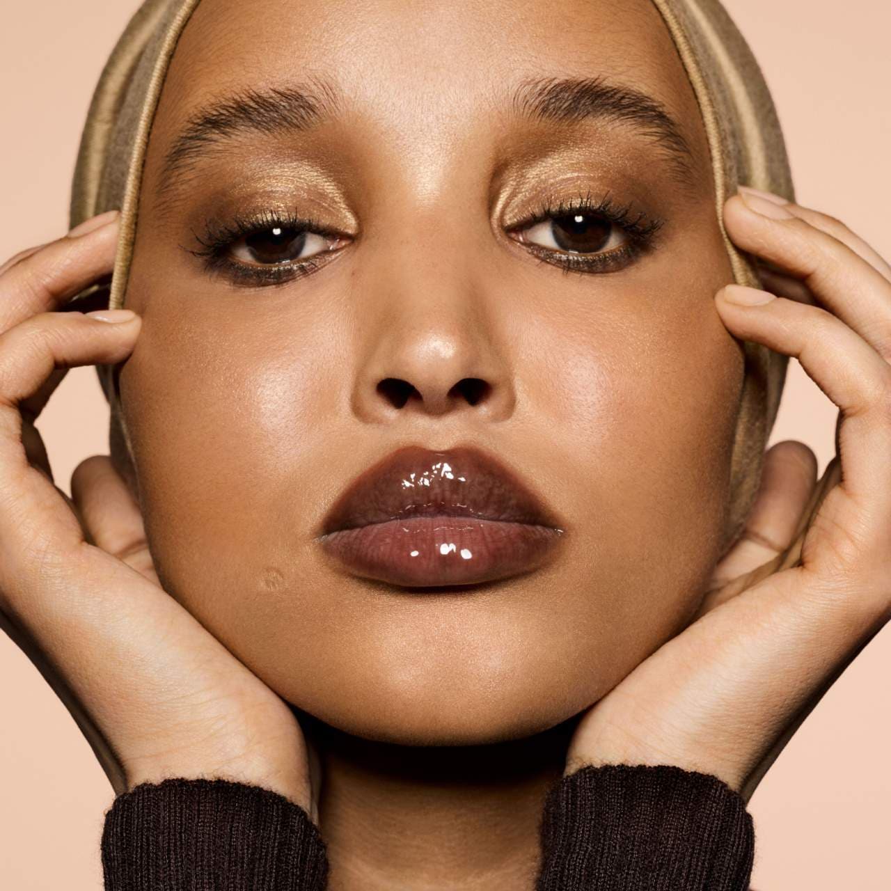 Fenty Beauty Gloss Bomb Heat Hot Chocolit 04 sheer rich brown lip plumper wet look shine tawny brown cruelty free